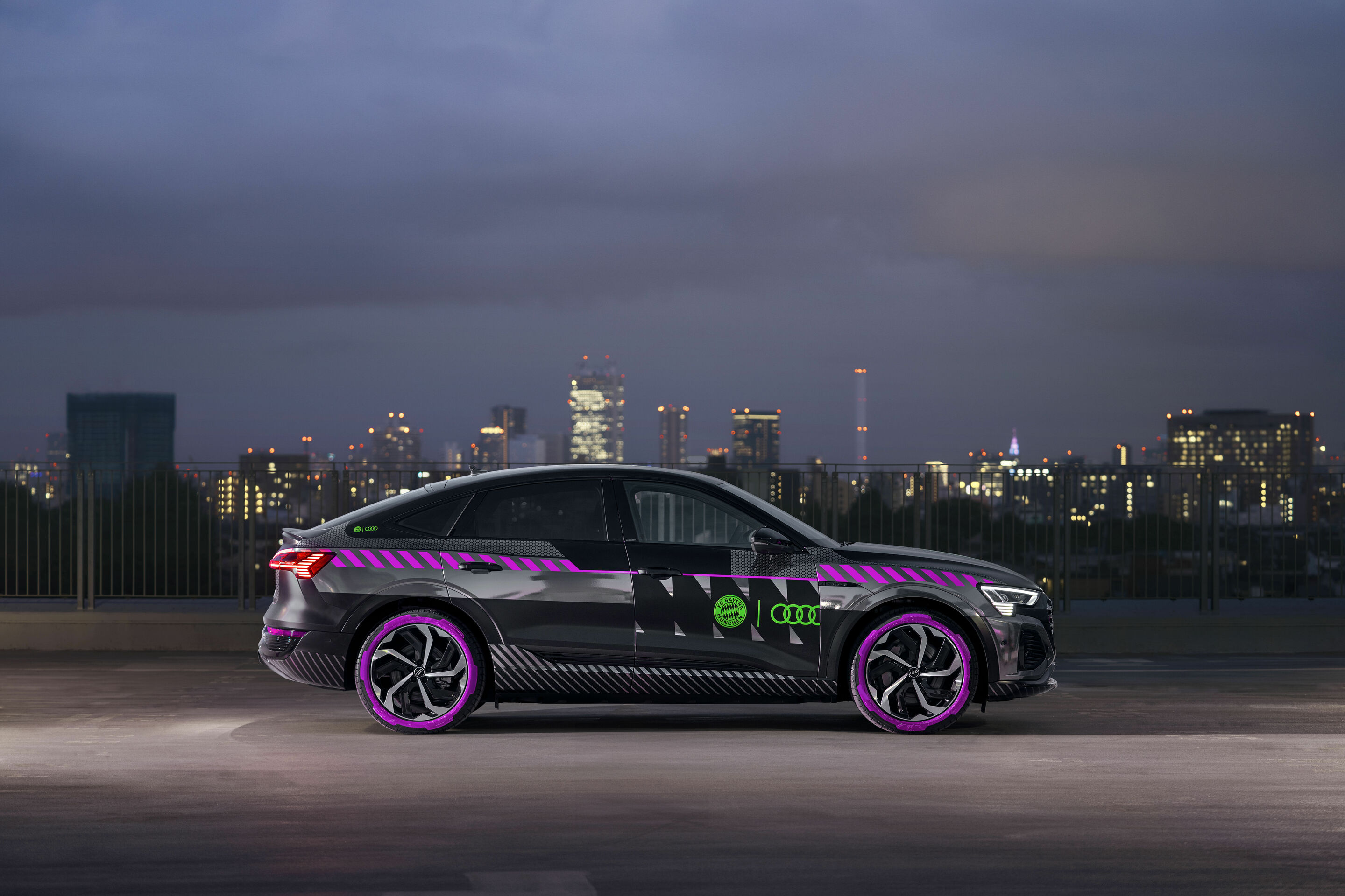 Audi Summer Tour - The Audi Q8 e-tron will be getting a special livery for the Audi Summer Tour 2023 (pictured: Tokyo, Japan), based on the design of the new FC Bayern away jersey.